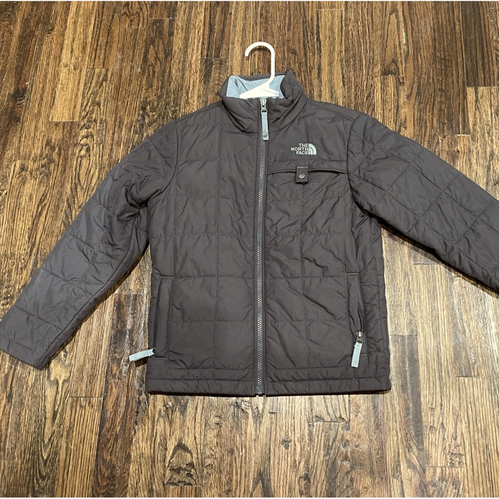 Gray youth North Face light down jacket.